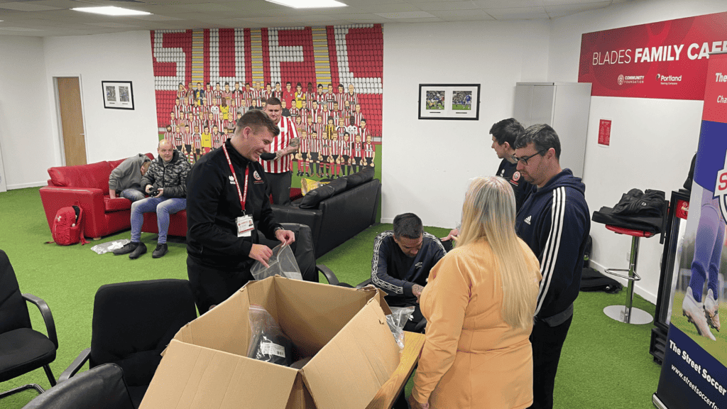 Boots being handed out at the Sheffield Utd Community Foundation